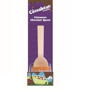 milk chocolate spoon stirrer and cinnamon