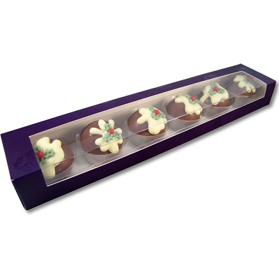 chocolates shaped liked christmas pudding in a purple box