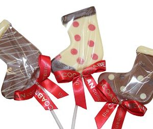 three chocolate lollipops in shape of stockings