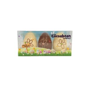 trio of milk and white chocolate easter eggs with flower pattern cocoabean