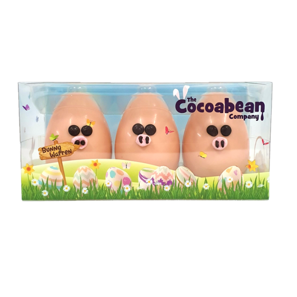 trio of pink chocolate pig easter eggs