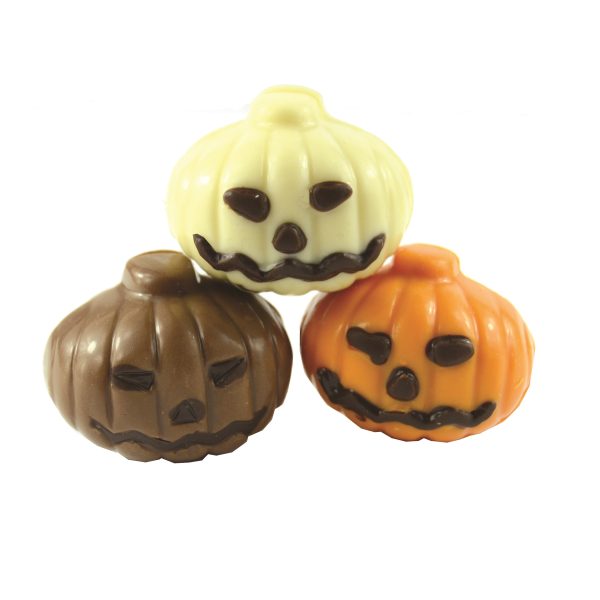 three chocolate pumpkins, milk, white and orange