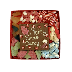 xmas sweets in a red box with personalised chocolate bar