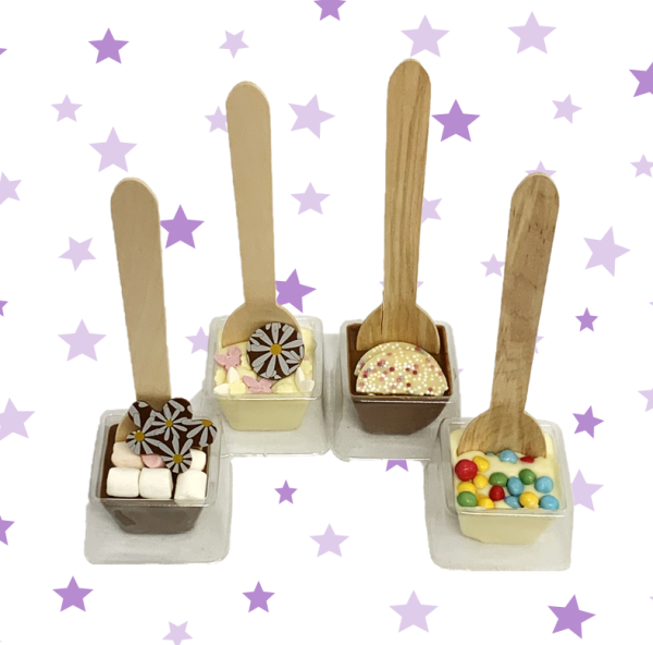 four chocolate spoon stirrers make your activity kit purple star backround