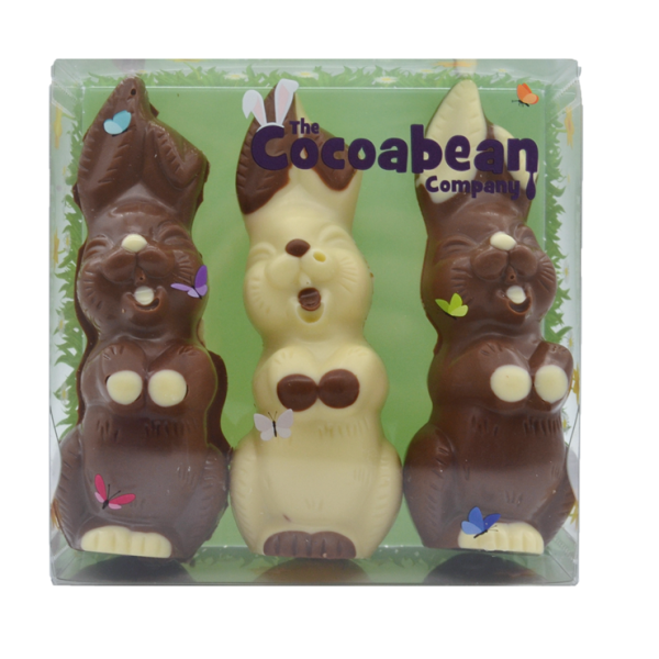 A trio of milk and white chocolate bunnies