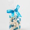 bagged baby dolphin sweets with blue ribbon