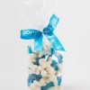 bagged baby dolphin sweets with blue ribbon