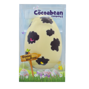 chocolate cow easter egg in spring packaging