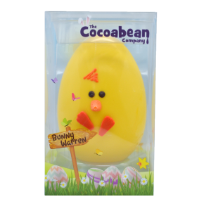 yellow and orange chocolate chick egg in spring packaging