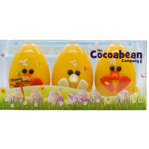 trio of yellow chick chocolate easter eggs in spring packaging