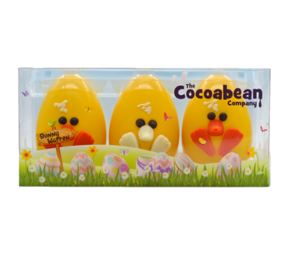 trio of yellow chick chocolate easter eggs in spring packaging